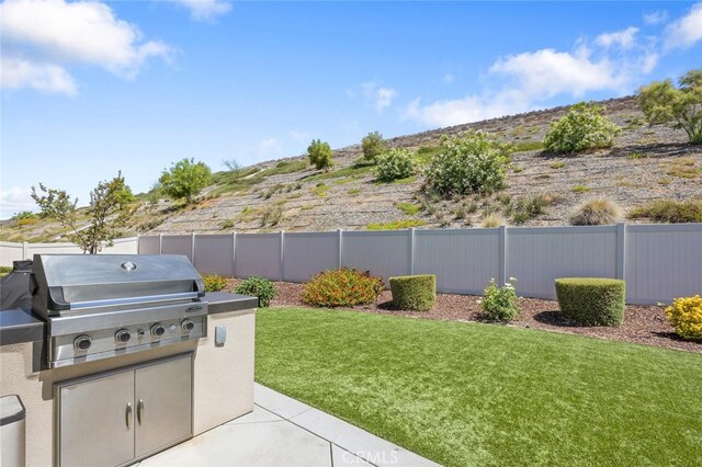 28816 Sedge Ln, Saugus, CA 91350 - fenced backyard with area for grilling