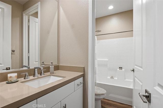 28816 Sedge Ln, Saugus, CA 91350 - bathroom featuring vanity, wood finished floors,  shower combination, and recessed lighting