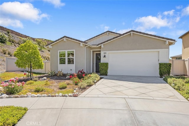 28816 Sedge Ln, Saugus, CA 91350 - ranch-style house with a garage, stucco siding, and driveway
