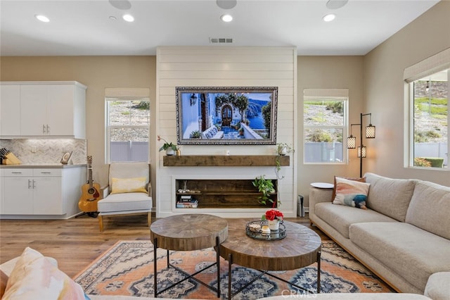 28816 Sedge Ln, Saugus, CA 91350 - living room with light wood-style floors and recessed lighting