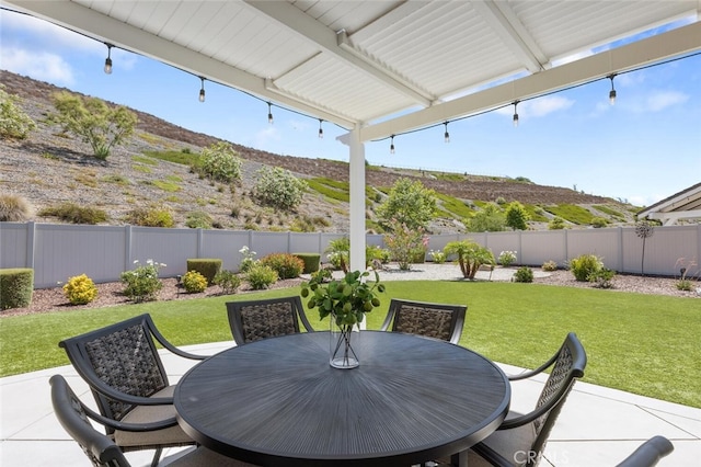28816 Sedge Ln, Saugus, CA 91350 - fenced backyard with outdoor dining area, a mountain view, and a patio