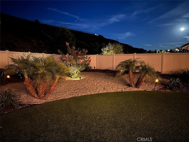 28816 Sedge Ln, Saugus, CA 91350 - yard at night featuring a fenced backyard