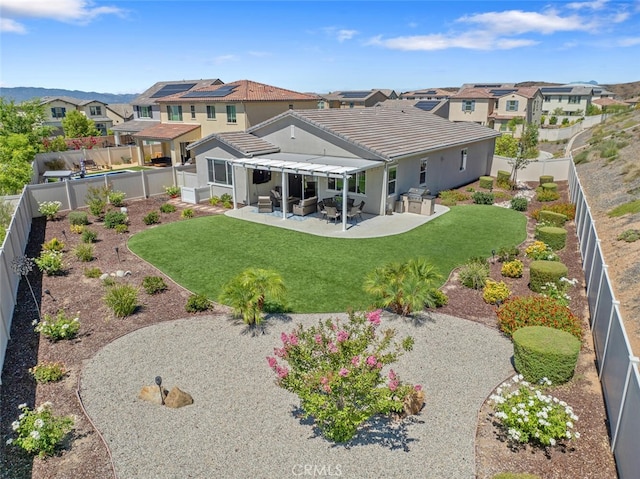 28816 Sedge Ln, Saugus, CA 91350 - back of house with a residential view, stucco siding, a patio area, and a fenced backyard