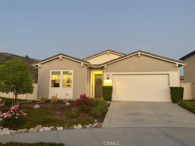 28816 Sedge Ln, Saugus, CA 91350 - single story home with a garage, driveway, and stucco siding