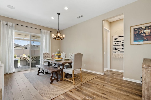 28816 Sedge Ln, Saugus, CA 91350 - dining room with wood finished floors, a chandelier, and recessed lighting