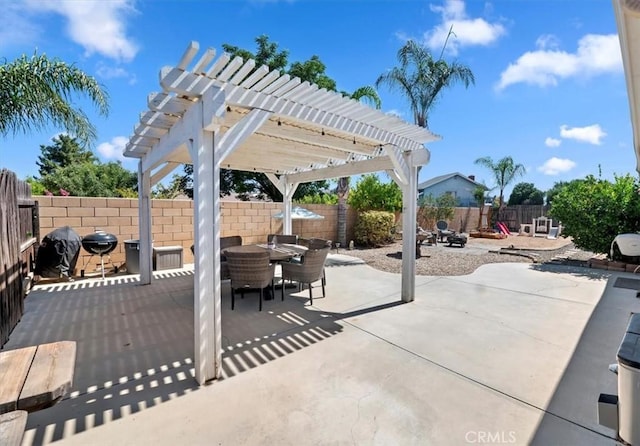 27242 Cabrillo Dr, Menifee, CA 92586 - fenced backyard with outdoor dining area, a pergola, and a patio area