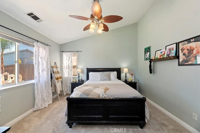 27242 Cabrillo Dr, Menifee, CA 92586 - bedroom featuring light colored carpet, vaulted ceiling, and a ceiling fan