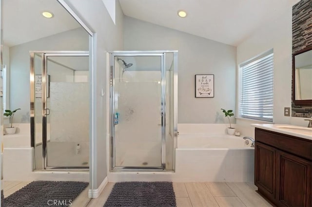 27242 Cabrillo Dr, Menifee, CA 92586 - full bathroom featuring vaulted ceiling, vanity, a bath, a shower stall, and recessed lighting