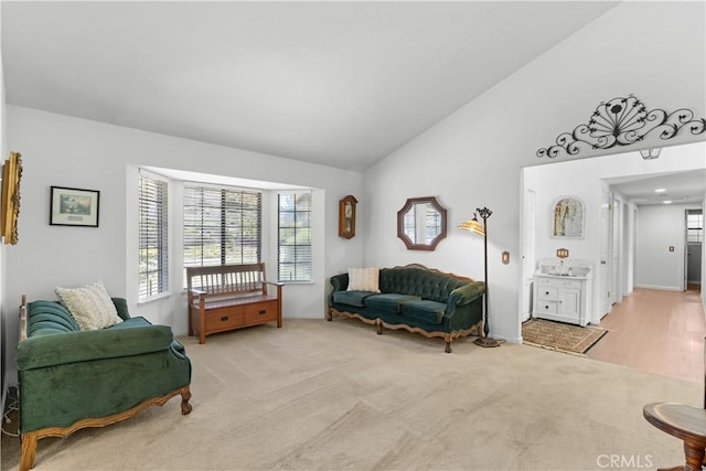 181 Eucalyptus Rd, Nipomo, CA 93444 - living area featuring light colored carpet and high vaulted ceiling