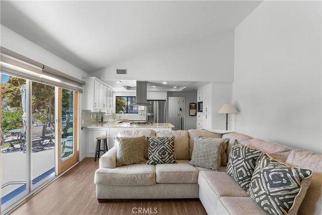 181 Eucalyptus Rd, Nipomo, CA 93444 - living room featuring light wood-style floors and high vaulted ceiling