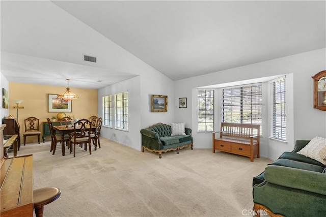 181 Eucalyptus Rd, Nipomo, CA 93444 - living area featuring a chandelier, light carpet, and high vaulted ceiling