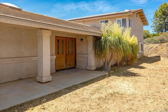 28880 Mac Tan Rd, Valley Center, CA 92082 - doorway to property featuring stucco siding