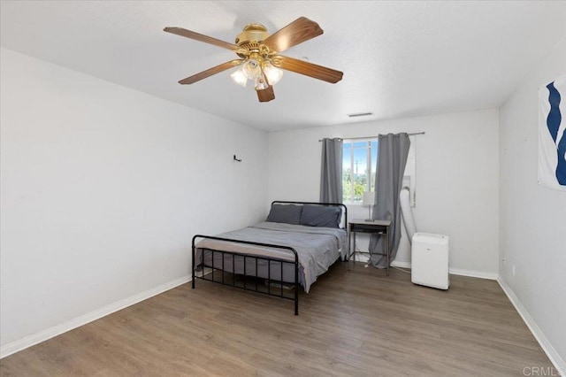 28880 Mac Tan Rd, Valley Center, CA 92082 - bedroom with wood finished floors and ceiling fan