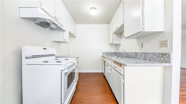 6045 Hazelhurst Pl, North Hollywood, CA 91606 - kitchen featuring white stove, wood finished floors, white cabinetry, and light stone countertops