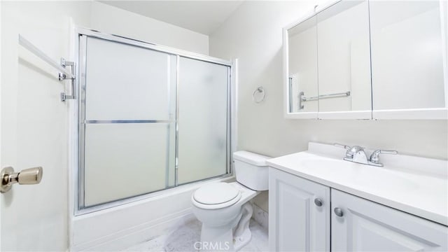 6045 Hazelhurst Pl, North Hollywood, CA 91606 - bathroom featuring vanity, enclosed tub / shower combo, and marble look tiles
