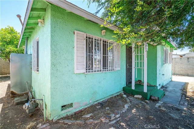11860 Athens Way, Los Angeles, CA 90061 - view of home's exterior featuring stucco siding