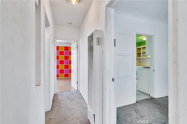 11860 Athens Way, Los Angeles, CA 90061 - hallway featuring carpet and a heating unit