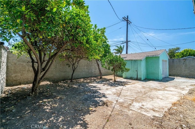 11860 Athens Way, Los Angeles, CA 90061 - fenced backyard featuring a shed