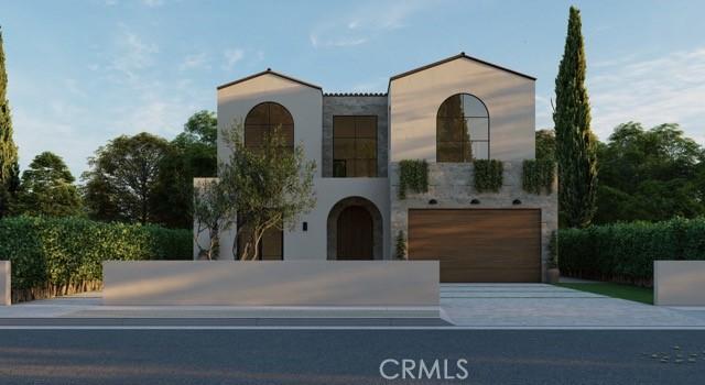 4116 Greenbush Ave, Sherman Oaks, CA 91423 - mediterranean / spanish-style house featuring concrete driveway, an attached garage, and stucco siding