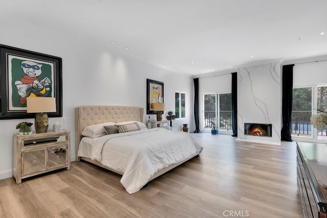 176 Saddlebow Rd, Bell Canyon, CA 91307 - bedroom featuring access to outside, light wood finished floors, a high end fireplace, and recessed lighting