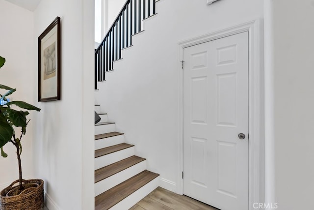 176 Saddlebow Rd, Bell Canyon, CA 91307 - stairway featuring wood finished floors and baseboards