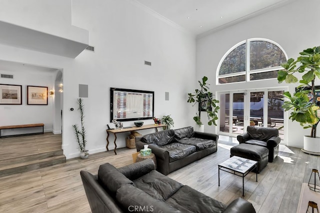 176 Saddlebow Rd, Bell Canyon, CA 91307 - living area featuring a high ceiling, ornamental molding, and wood finished floors