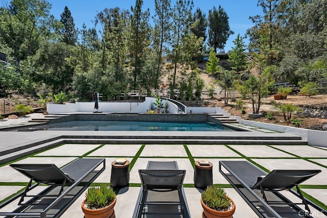 176 Saddlebow Rd, Bell Canyon, CA 91307 - swimming pool featuring a patio area