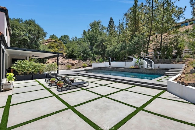 176 Saddlebow Rd, Bell Canyon, CA 91307 - outdoor pool featuring a patio area and ceiling fan
