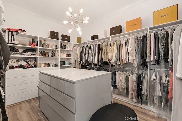 176 Saddlebow Rd, Bell Canyon, CA 91307 - spacious closet with a chandelier and light wood finished floors