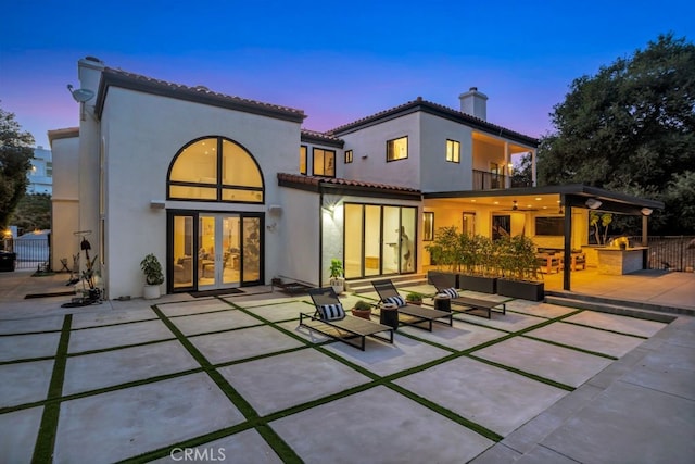 176 Saddlebow Rd, Bell Canyon, CA 91307 - back of property featuring french doors, a patio, a chimney, a balcony, and a tiled roof