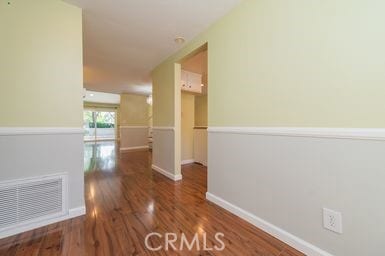 14 Featherwood, Irvine, CA 92612 - hall featuring dark wood-style flooring and baseboards