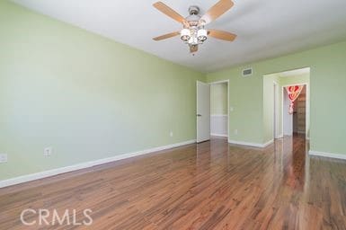 14 Featherwood, Irvine, CA 92612 - empty room with wood finished floors and ceiling fan