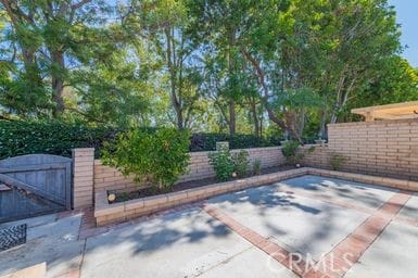 14 Featherwood, Irvine, CA 92612 - fenced backyard with a gate