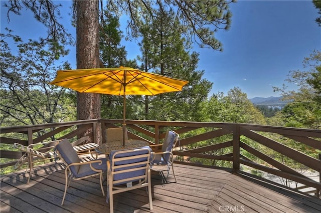 544 Old Toll Rd, Lake Arrowhead, CA 92352 - wooden deck featuring outdoor dining area and a mountain view