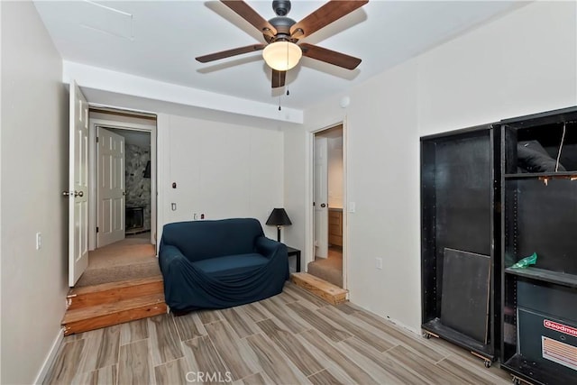 544 Old Toll Rd, Lake Arrowhead, CA 92352 - sitting room with light wood finished floors and ceiling fan
