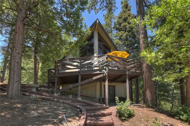 544 Old Toll Rd, Lake Arrowhead, CA 92352 - rear view of house featuring a deck