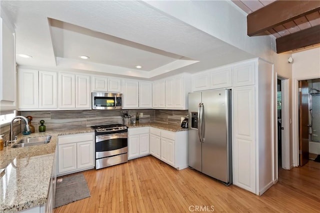 544 Old Toll Rd, Lake Arrowhead, CA 92352 - kitchen featuring stainless steel appliances, tasteful backsplash, light wood-style floors, beamed ceiling, and recessed lighting