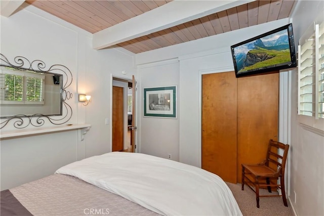 544 Old Toll Rd, Lake Arrowhead, CA 92352 - carpeted bedroom featuring a closet and a wood ceiling with exposed beams
