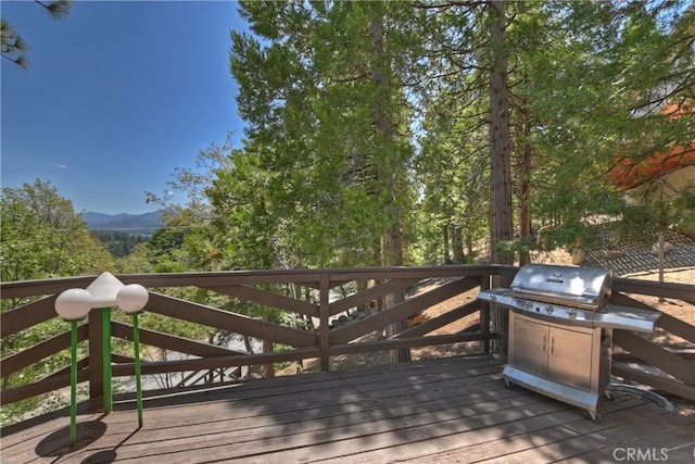 544 Old Toll Rd, Lake Arrowhead, CA 92352 - wooden terrace with a grill and a mountain view