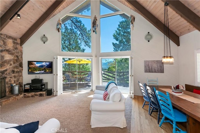 544 Old Toll Rd, Lake Arrowhead, CA 92352 - living area featuring a wood ceiling with exposed beams, high vaulted ceiling, wood finished floors, and plenty of natural light