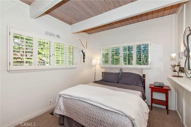 544 Old Toll Rd, Lake Arrowhead, CA 92352 - carpeted bedroom with a wood ceiling with exposed beams and baseboards