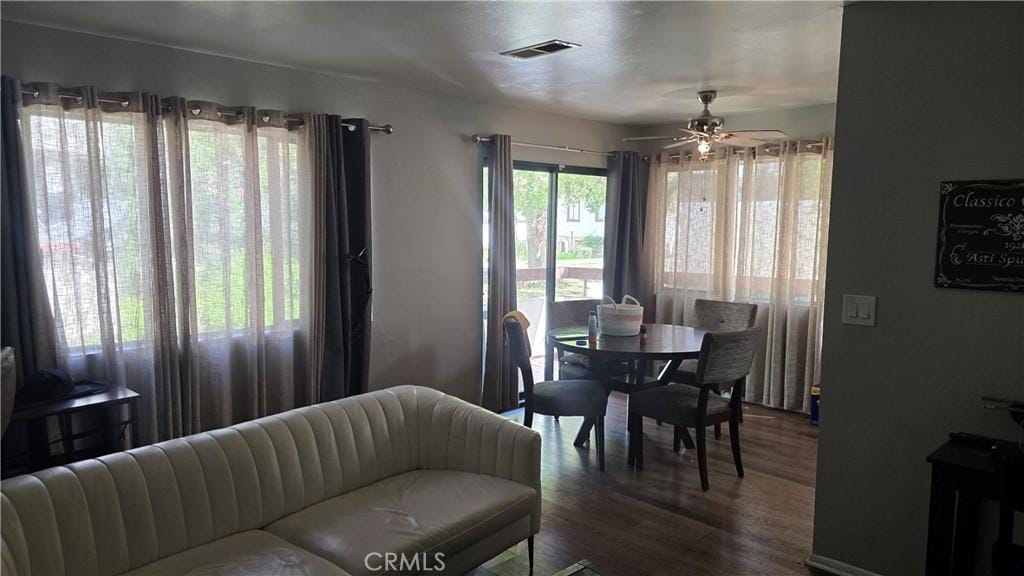 27907 Tyler Ln Unit 715, Canyon Country, CA 91387 - dining room featuring dark wood-style flooring and ceiling fan