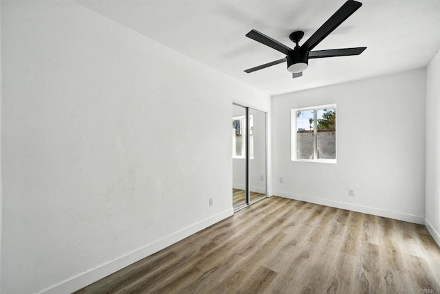 12049 Coping Pl, Lakeside, CA 92040 - unfurnished bedroom with wood finished floors, a ceiling fan, and a closet