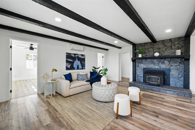 12049 Coping Pl, Lakeside, CA 92040 - living area featuring wood finished floors, beam ceiling, a wall mounted AC, ceiling fan, and recessed lighting