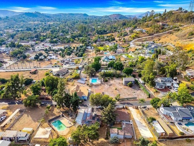 12049 Coping Pl, Lakeside, CA 92040 - aerial view of property's location featuring a mountainous background and nearby suburban area
