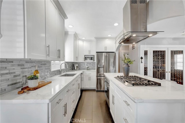 218 Covina Ave, Long Beach, CA 90803 - kitchen featuring island exhaust hood, stainless steel appliances, white cabinetry, a center island, and recessed lighting