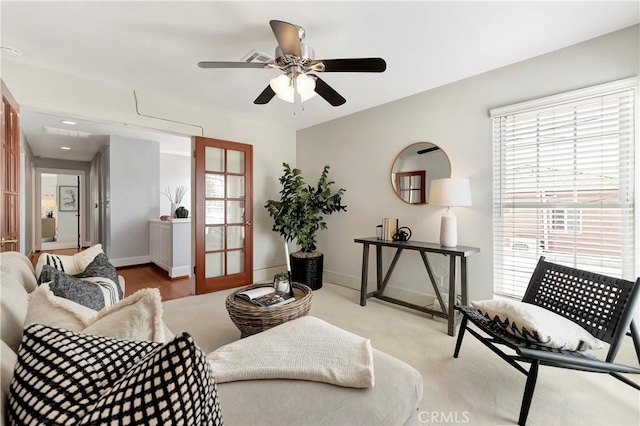 218 Covina Ave, Long Beach, CA 90803 - carpeted living room with a ceiling fan and baseboards