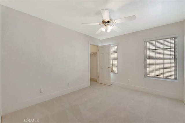 218 Covina Ave, Long Beach, CA 90803 - empty room with light colored carpet and ceiling fan