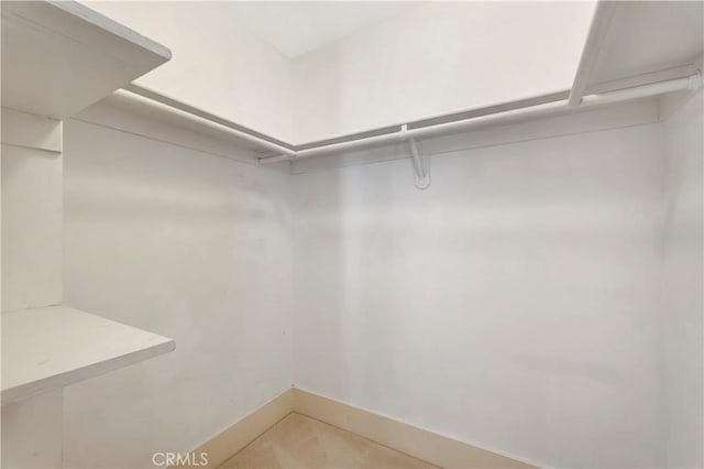 218 Covina Ave, Long Beach, CA 90803 - walk in closet featuring light carpet