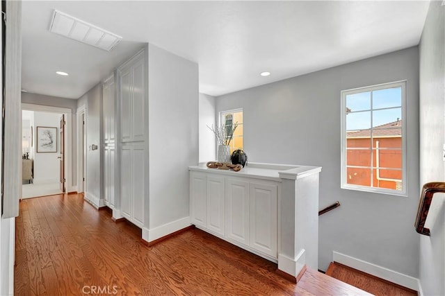 218 Covina Ave, Long Beach, CA 90803 - hall with an upstairs landing, dark wood-style floors, and recessed lighting